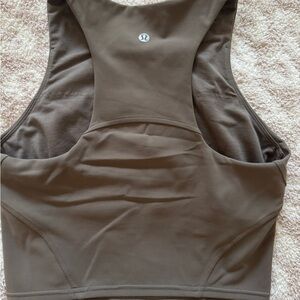 Lululemon Wunder Train Racerback
Tank Top
Nomad
Size 6